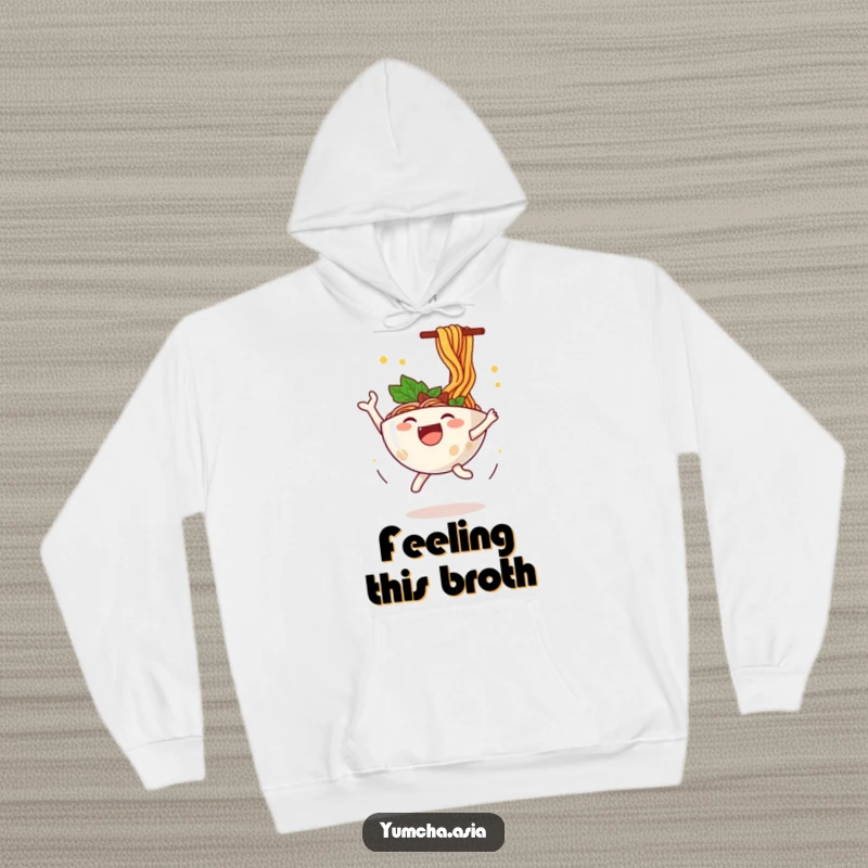 Funny ramen bowl hoodie featuring a happy character leaping with joy, surrounded by delightfully flying noodles.